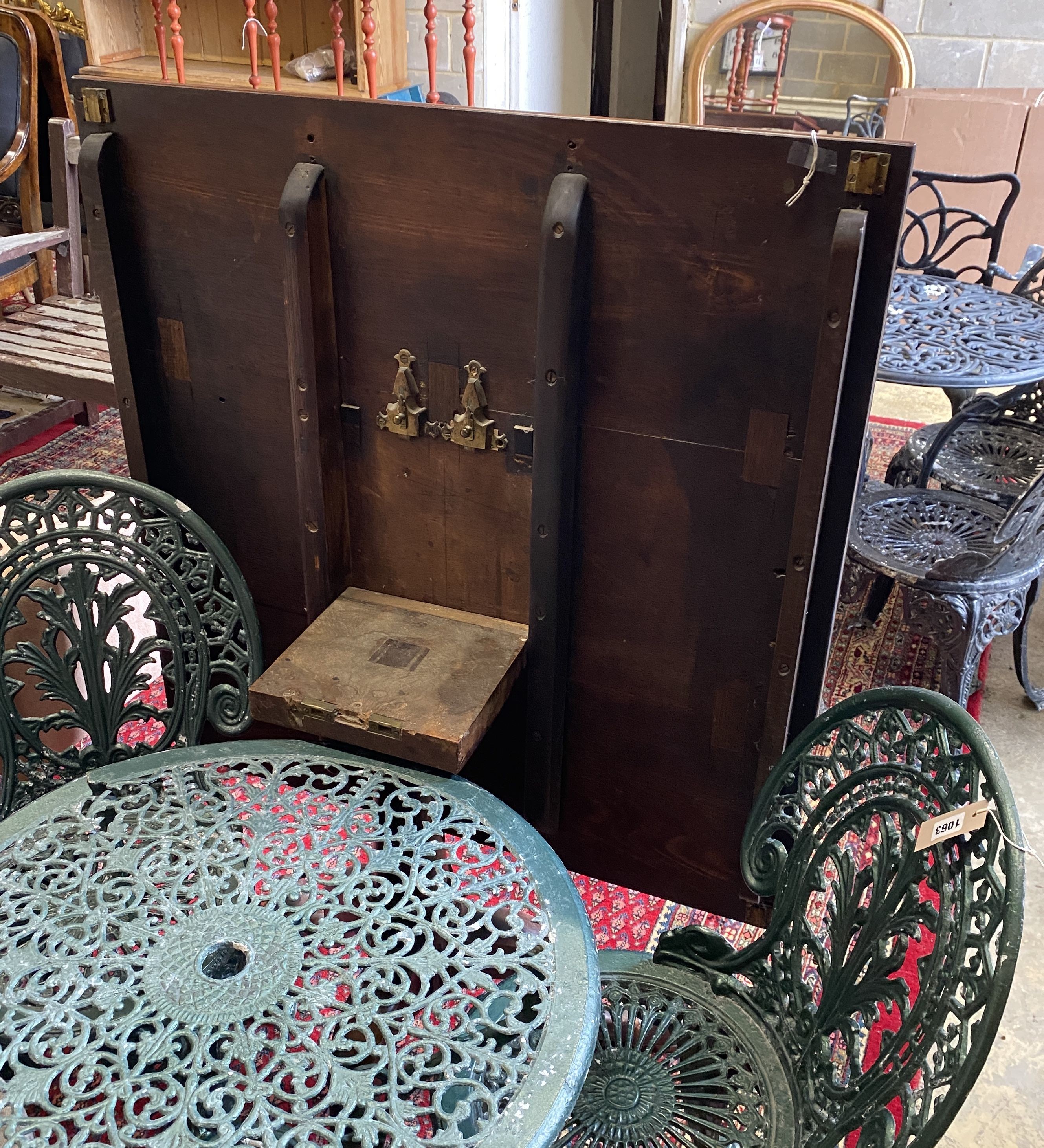 A George III mahogany tilt top breakfast table, formerly a central section of a larger table, width 90cm, depth 96cm, height 72cm